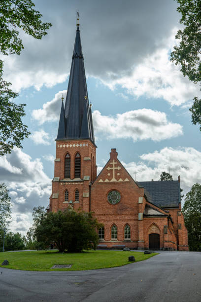 istock Beautiful brick church with a tall tower 1216388834