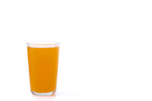 istock Glass of Orange juice with pulp isolate on white background, 1216391875