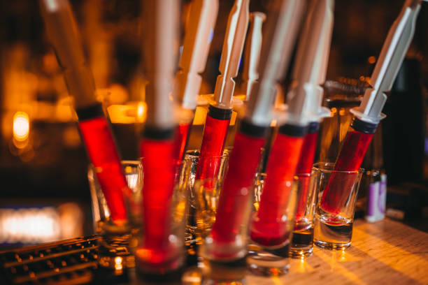 istock Bloody Mary cocktail in syringe 1216392741