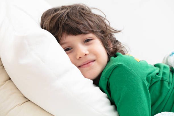 istock Sick little boy ready to sleep 1216394654
