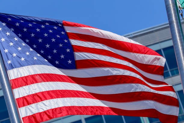 istock American flag waving in the wind 1216395888