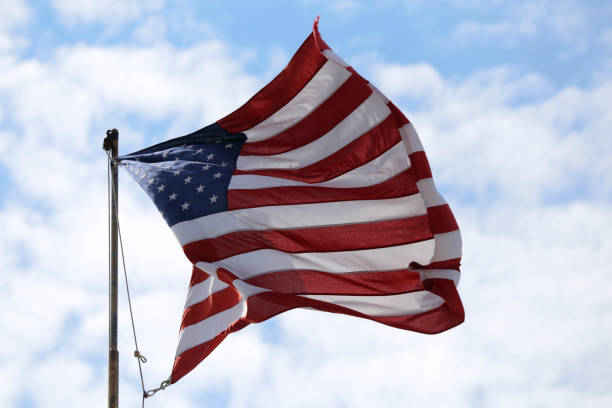 istock American flag waving in the wind 1216395918