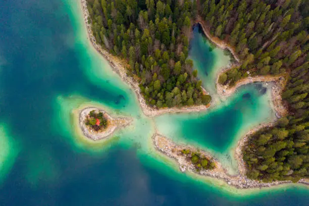 Landscape with an aerial view of the Eibsee lake shoreline, Bavaria Germany