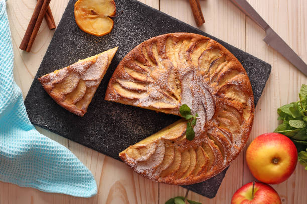 istock Apple taten on paper with honey and mint top view 1216398596