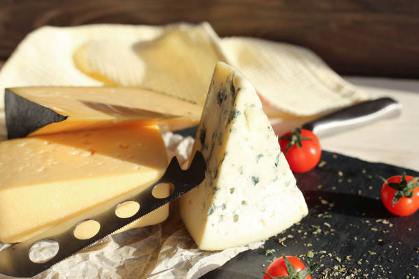 istock Dorblu cheese with tomatoes on a stone board 1216398680