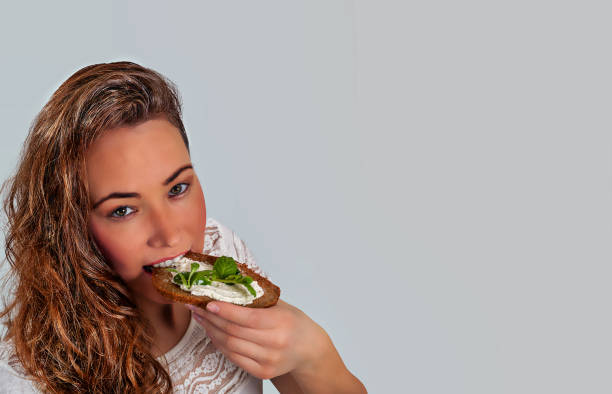 istock Woman eats vegan and healthy 1216400409