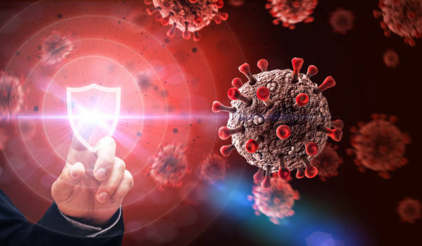 Protection Against COVID19 Virus Attack Abstract Concept Viruses and Shield. Defending against Virus Attack Concept. computer virus stock pictures, royalty-free photos & images