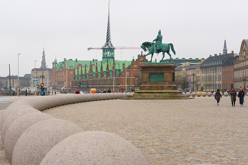 Copenhagen, Denmark - November 25, 2019 : Equestrian Statue of King Frederik VII on Christiansborg Slotsplads (Castle Square) in Copenhagen, Denmark on November 25, 2019.