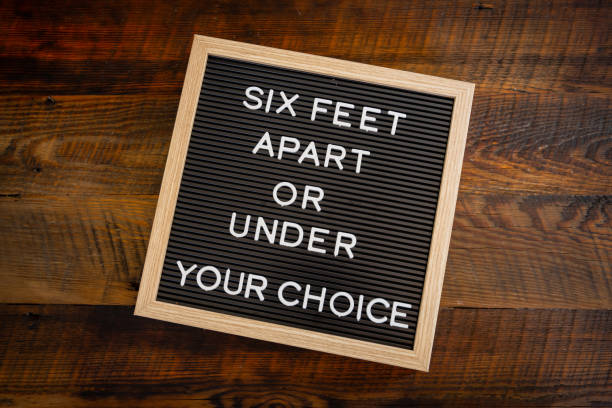 istock Six Feet Apart Or Under Your Choice 1216403253