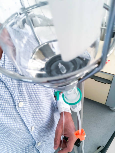 istock Patient with IV drip in hospital 1216406370