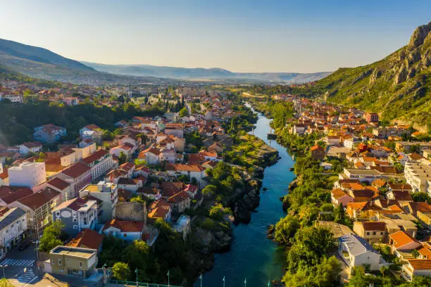 Drone point of view shot of an old town and a river, Mostar, Bosnia and Herzegovina