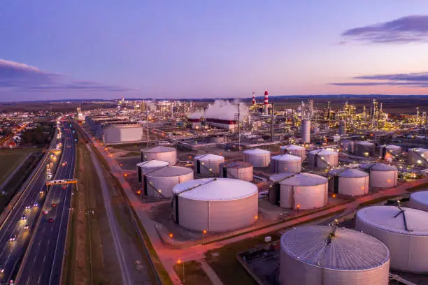 Photo of Aerial view of oil refinery at sunset.