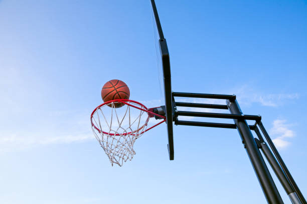 istock Basketball going into the hoop 1216410035