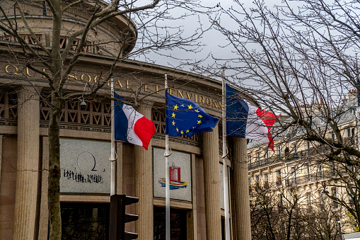Paris-France, March 3, 2020: French and European Union flags in front of state office. Horizontal composition.