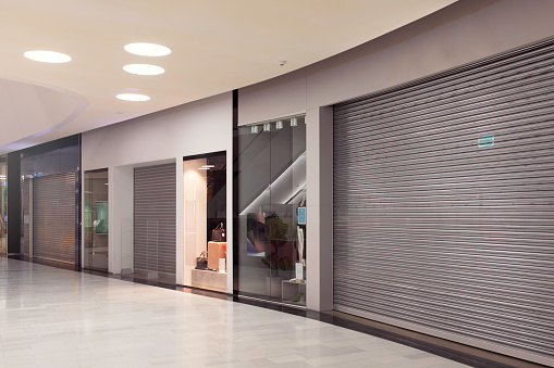 A set of closed shopping mall stores in a shopping mall.