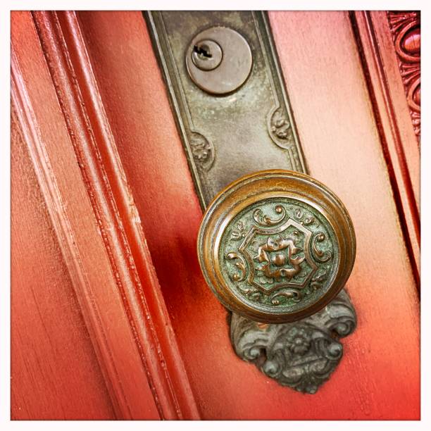 istock Old Red Door Close Up 1216414935