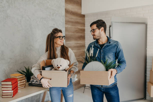 istock Couple planing how to decorate apartment 1216417993
