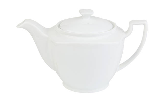 istock Green Chinese tea in teapots on white background 1216421264