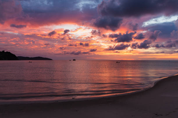 istock Beautiful vivid sunset at paradise beach 1216423290