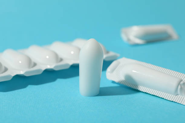 istock Anal or vaginal candles on blue background, close up 1216424203