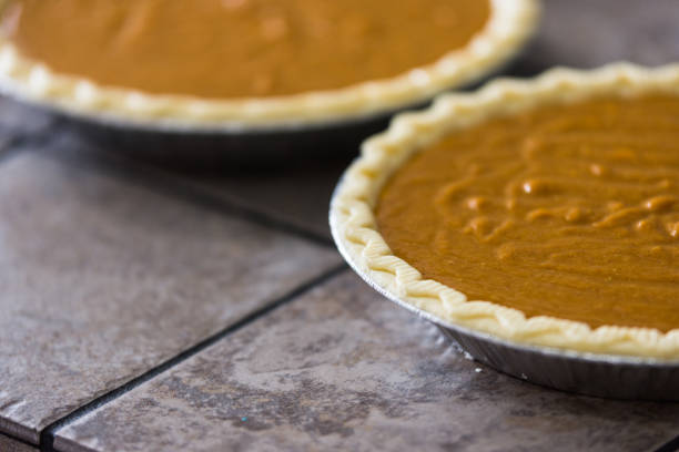 istock Homemade pumpkin pies ready to bake 1216424939