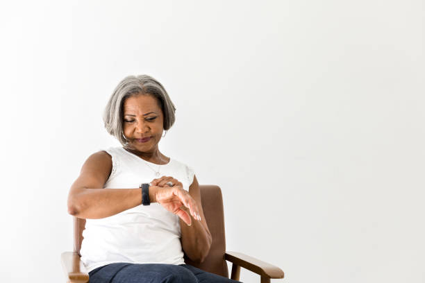 istock Serious woman checks the time 1216426237