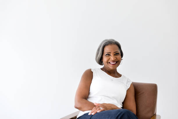 istock Senior woman smiles confidently 1216426246
