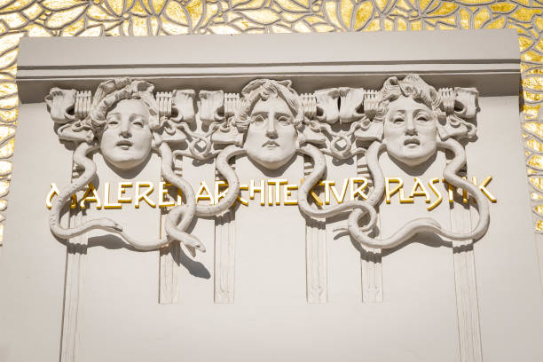 Detail of relief on the facade of the Vienna Secession Building. The three snake masks represent painting, architecture and sculpture. The building was built in 1898 by architect Joseph Maria Olbrich, and became a symbol of the Viennese Secession movement (Art Nouveau).