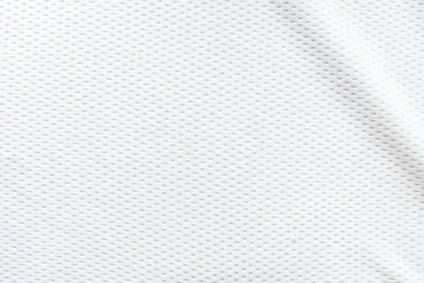 istock Selective focus, White mesh fabric background. cloth sport wear texture for exercise. light weight, good air flow, cool and easy to dry from sweat. abstract wallpaper with copy space for text. 1216427848