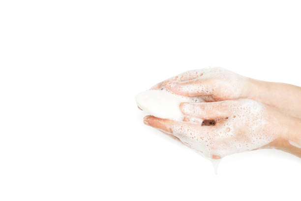 istock Woman washing her hand with soap 1216428399