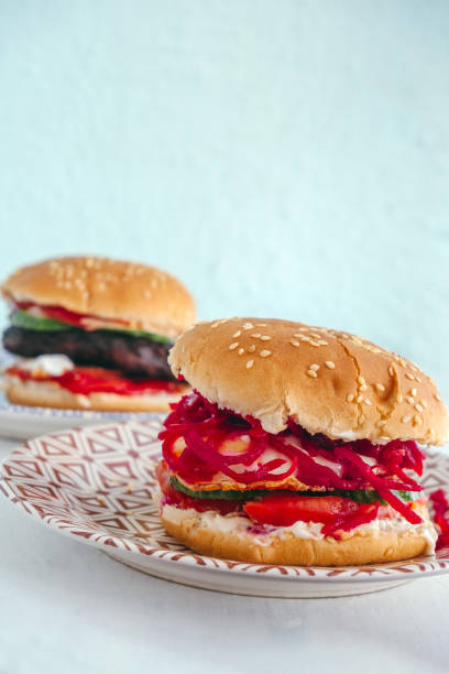 istock real homemade burger with egg and pickled beetroot on a plate 1216433510