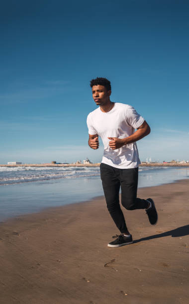 istock Portrait of an athletic man running. 1216433614
