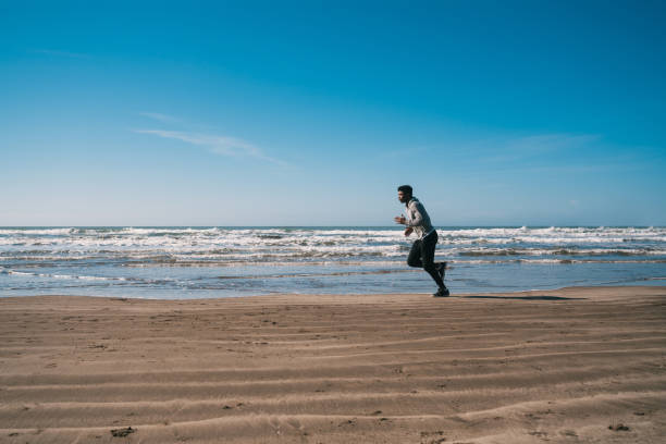 istock Portrait of an athletic man running. 1216433616