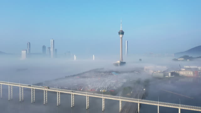 4K-Real Time: Macau Tower and Cityscape in Sea of ​​Clouds at Morning