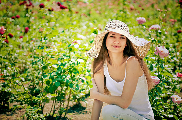 istock Young woman wearing sun hat 121643992