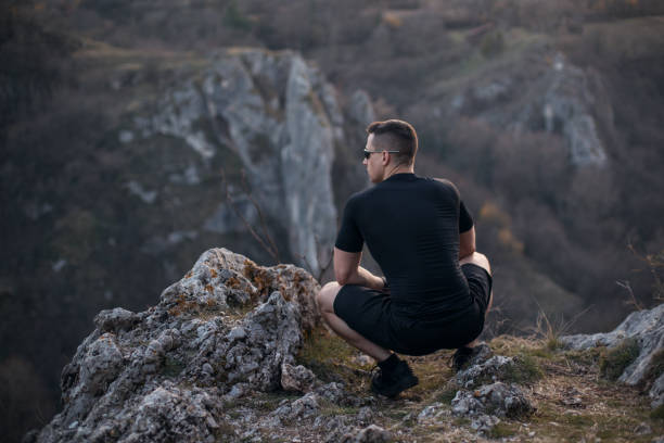 istock Young strong man on the mountain after run 1216440365