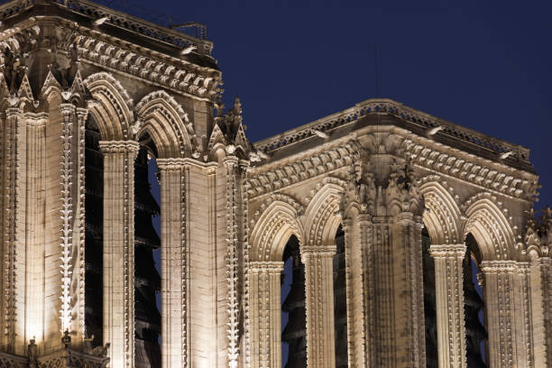 istock Notre Dame de Paris at night 1216440414