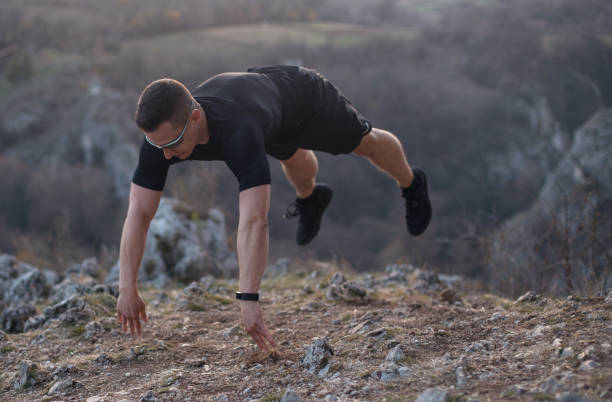 istock Young man exercising in nature 1216440736