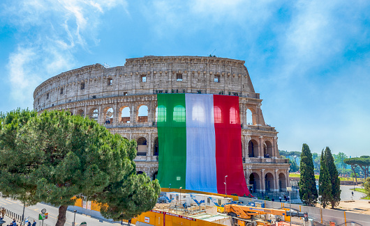 Rome, Italy - June 2, 2019: Colosseum dressed in the tricolor flag of Italy on Republic Day in Rome, Italy.