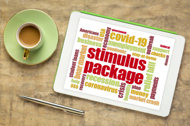 stimulus package during coronavirus pandemic word cloud stimulus package word cloud on a digital tablet, relief bill during covid-19 coronavirus pandemic concept recover tab stock pictures, royalty-free photos & images