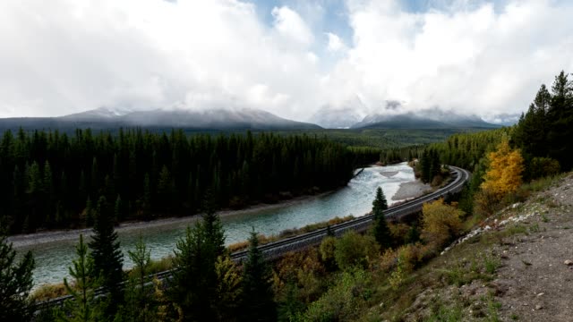 Morant's Curve iconic railway in autumn valley and bow river at Calgary