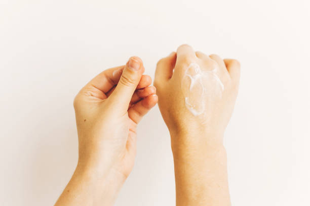 istock Avoiding dry skin. Hands applying moisturizing cream and massaging skin after washing hands. Treatment for dry skin. Luxury skin care. Hand cream. 1216446319