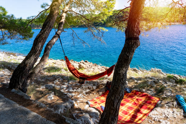 hanging hammock in Cikat forest park beach Mali Losinj .