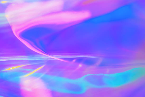 istock Abstract trendy rainbow colored blurred holographic background 1216448482