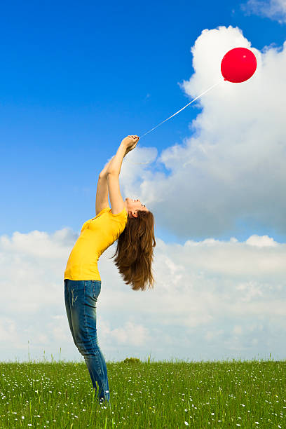 istock Girl with a balloon 121645123