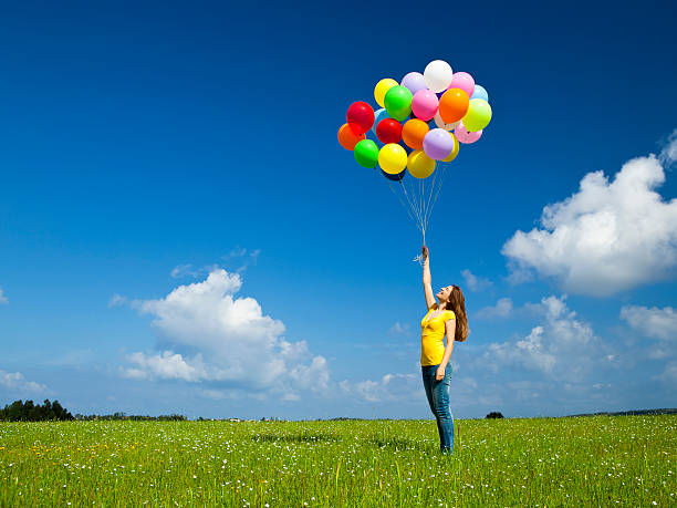 istock Girl with colorful balloons 121645167