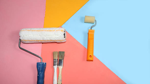 istock Repair tools on a multi-colored painted background. Shop banner, geometry. Minimal renovation and construction concept. Top view, place for text. 1216452561