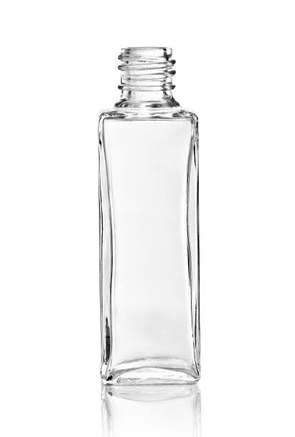 istock little empty glass bottle isolated on white 1216452868