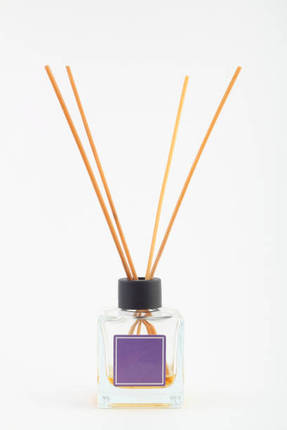 istock incense sticks in vase isolated on white 1216455048