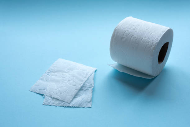 istock paper towel on blue background 1216456495